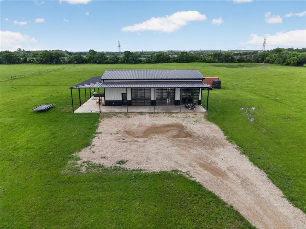 9082 Wolf Run Krum, TX 76249 - Photo 37 of 38 a view of a house with a yard