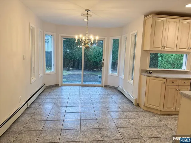 a view of backyard with green space