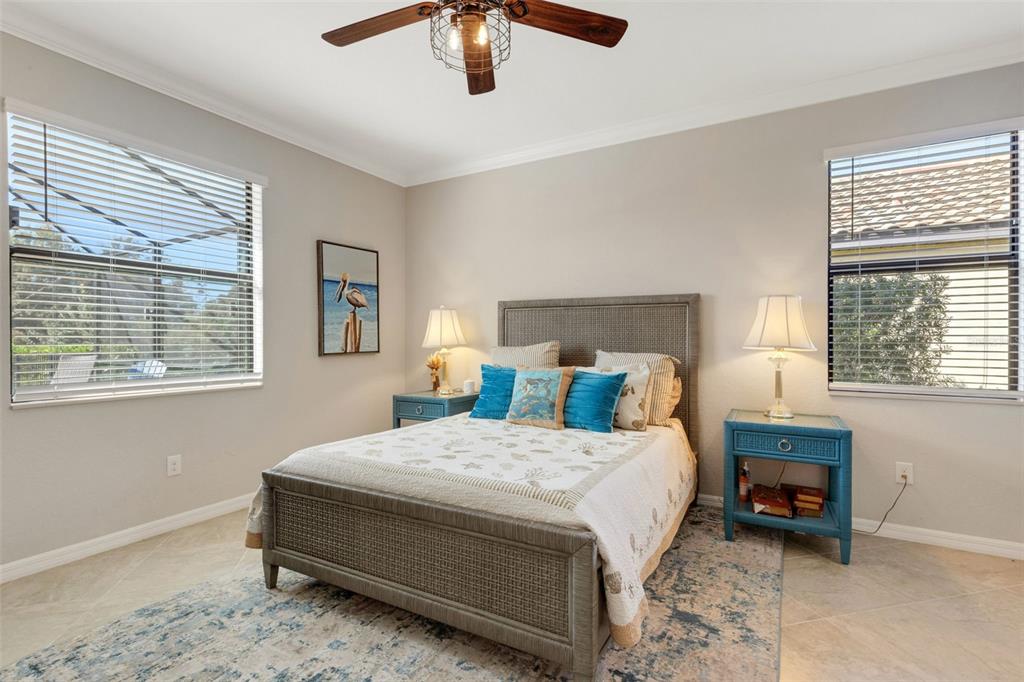 20573 Trattoria Loop Venice, FL 34293 - Photo 18 of 46 a bedroom with a bed and a window