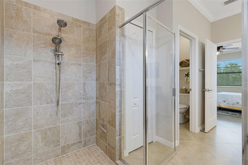 20573 Trattoria Loop Venice, FL 34293 - Photo 23 of 46 a bathroom with a shower and a sink