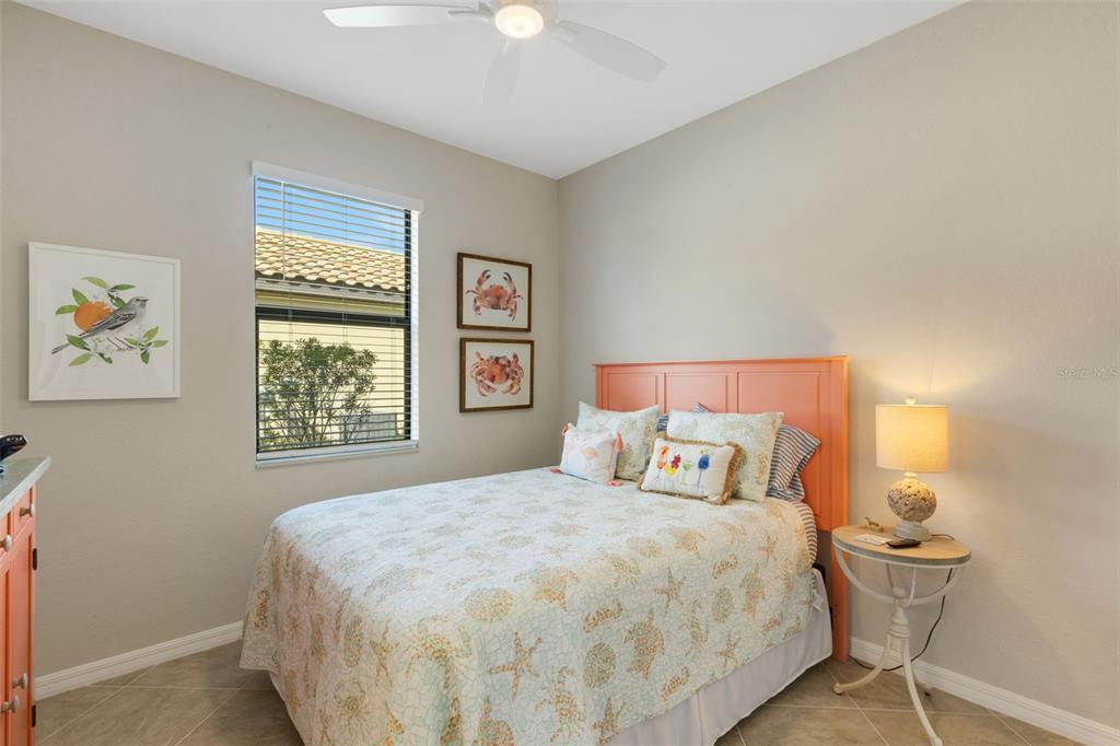 20573 Trattoria Loop Venice, FL 34293 - Photo 25 of 46 a bedroom with a bed and window