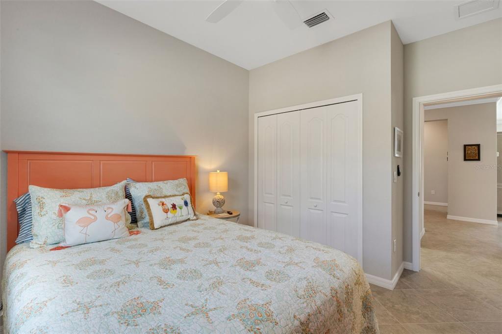 20573 Trattoria Loop Venice, FL 34293 - Photo 27 of 46 a bedroom with a bed and a night stand