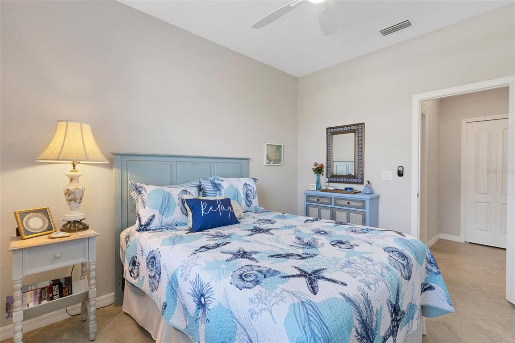 20573 Trattoria Loop Venice, FL 34293 - Photo 32 of 46 a bedroom with a bed and a closet