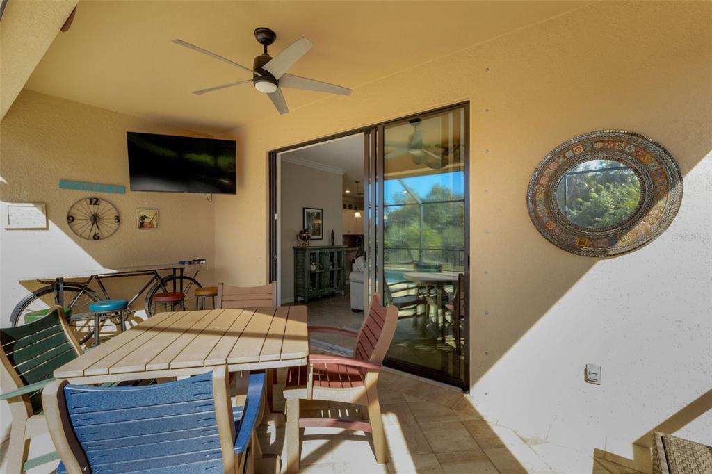 20573 Trattoria Loop Venice, FL 34293 - Photo 36 of 46 a view of a dining room with furniture and chandelier