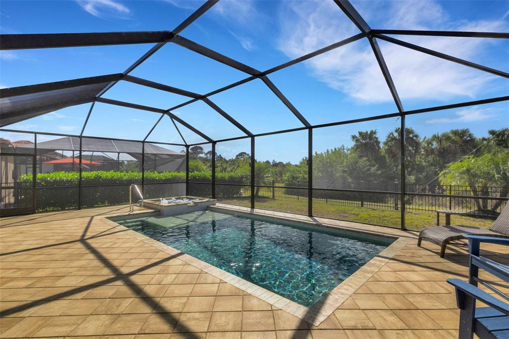 20573 Trattoria Loop Venice, FL 34293 - Photo 41 of 46 a view of a swimming pool with a porch