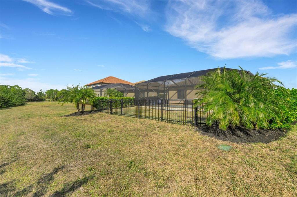 20573 Trattoria Loop Venice, FL 34293 - Photo 45 of 46 a view of a garden with a yard