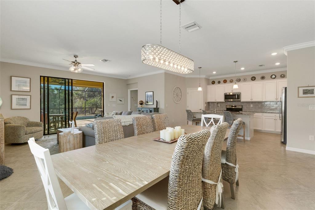 20573 Trattoria Loop Venice, FL 34293 - Photo 7 of 46 a large kitchen with a table and chairs
