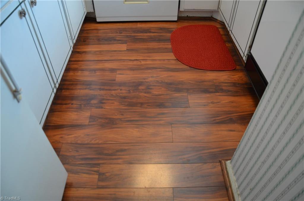 2235 Shadow Valley Road High Point, NC 27265 - Photo 18 of 18 Kitchen and hall have these beautiful floors. Home also has some newer carpet.