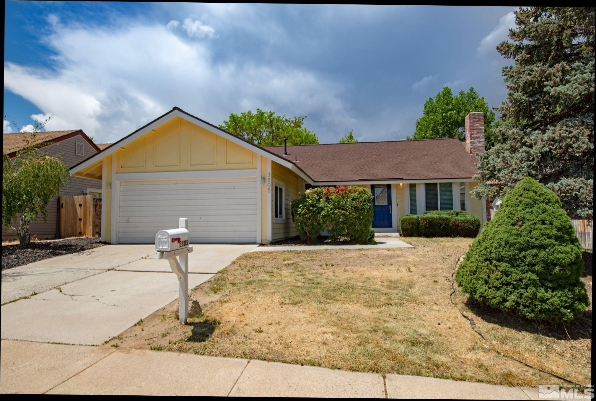 3805 Bexley Square Reno, NV 89503 - Photo 1 of 35 a front view of a house with garden