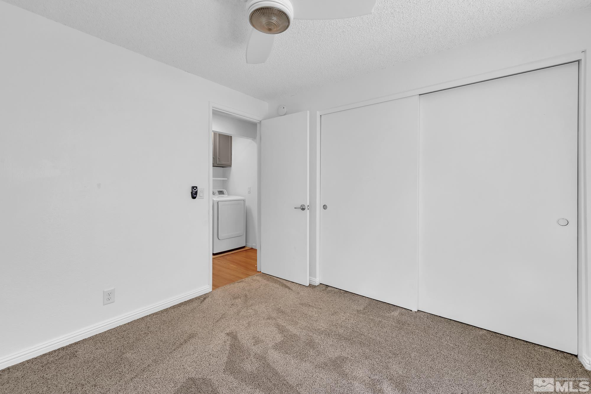 3805 Bexley Square Reno, NV 89503 - Photo 23 of 35 an empty room with an entryway