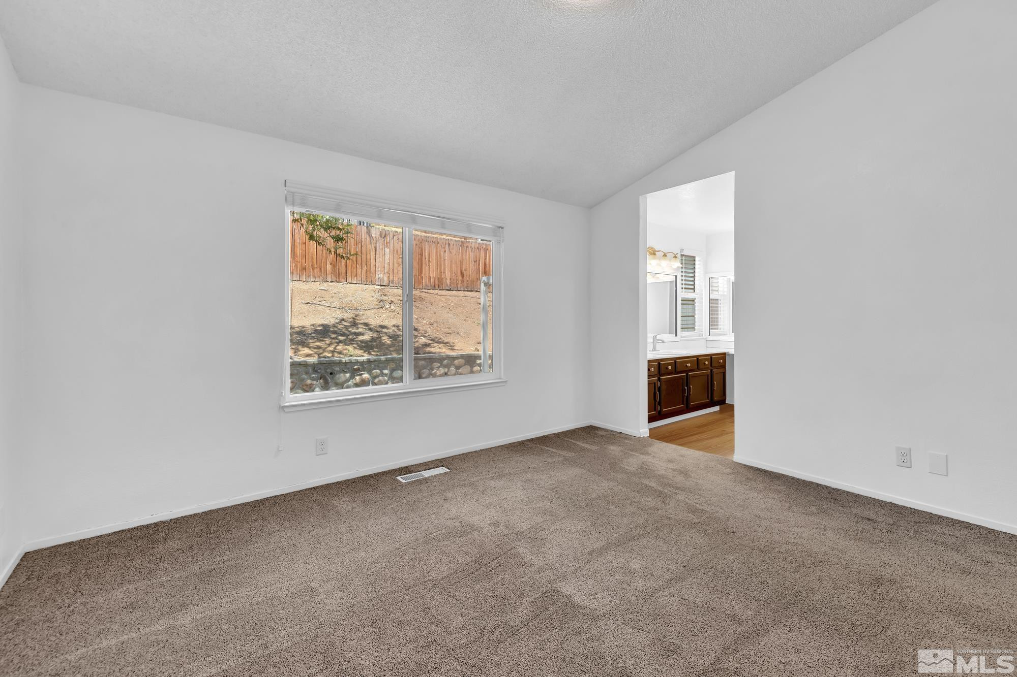3805 Bexley Square Reno, NV 89503 - Photo 26 of 35 an empty room with windows
