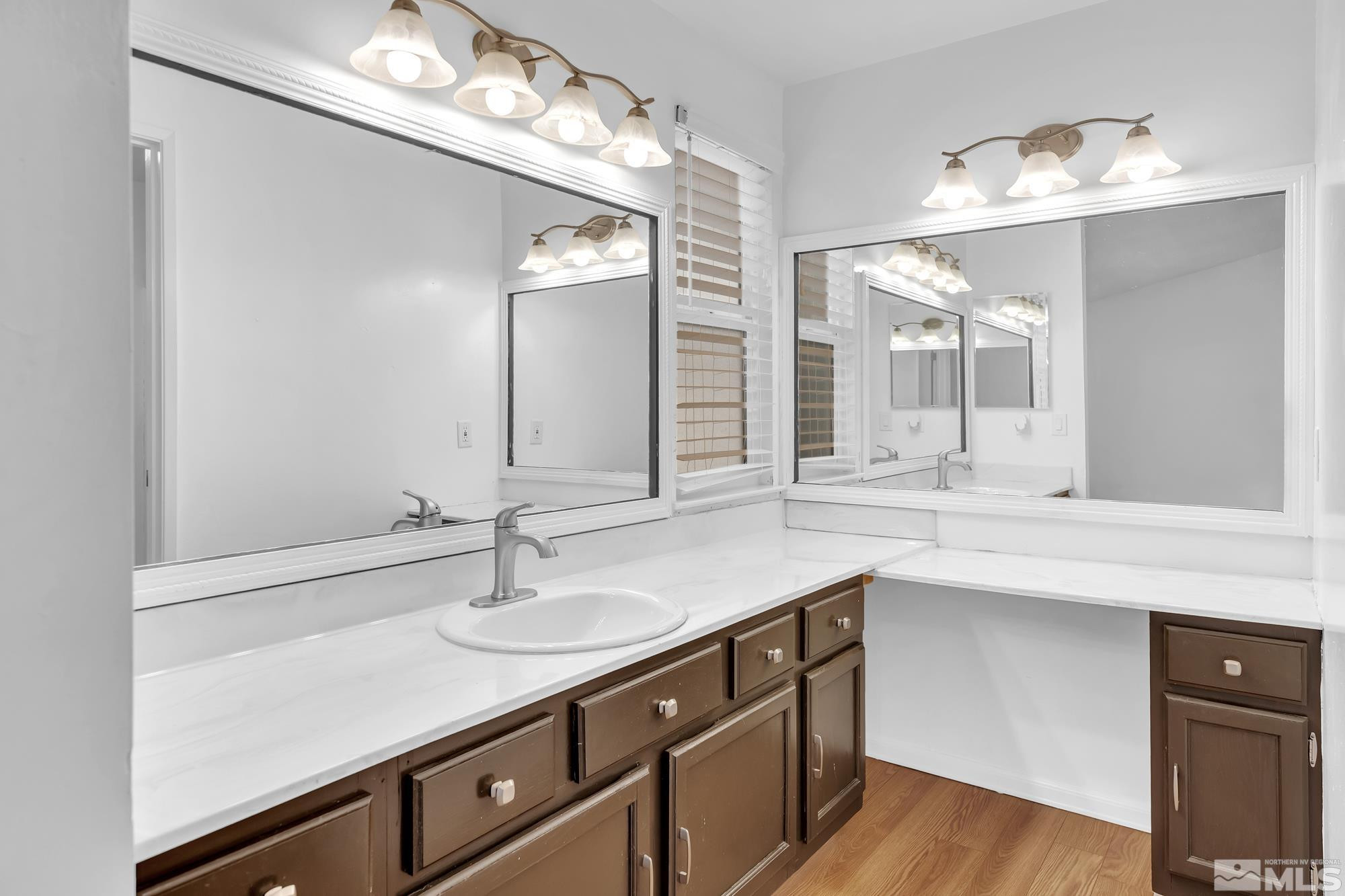 3805 Bexley Square Reno, NV 89503 - Photo 27 of 35 a bathroom with a sink and a mirror