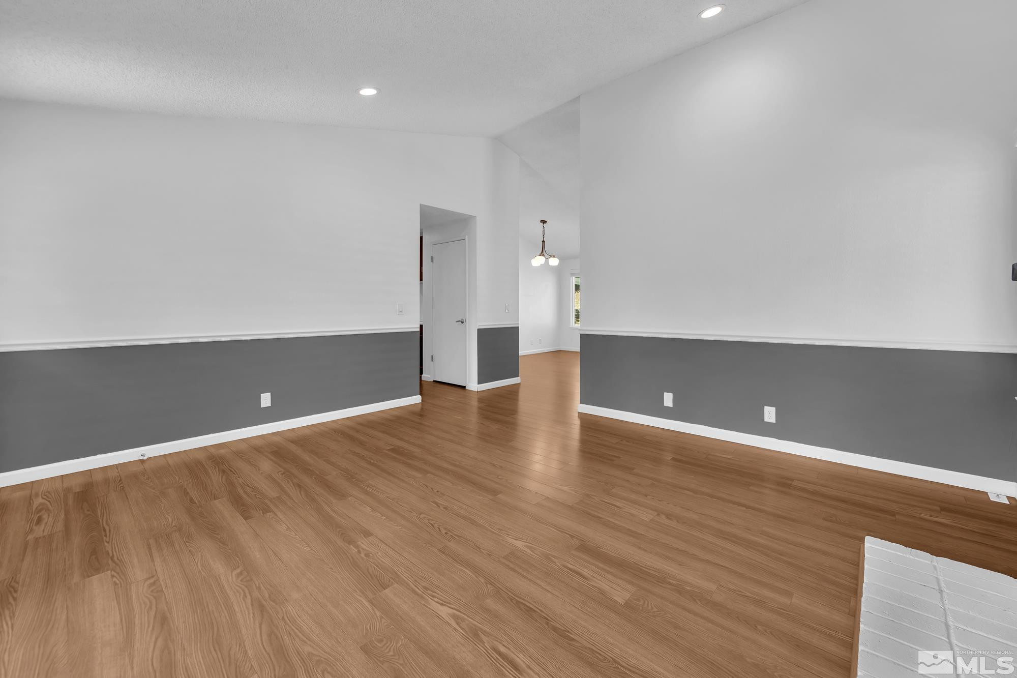 3805 Bexley Square Reno, NV 89503 - Photo 5 of 35 a view of an empty room with wooden floor