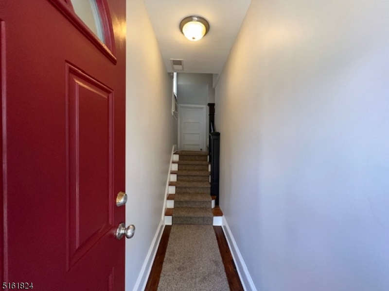 40 Codington Place Somerville, NJ 08876 - Photo 2 of 10 a view of a hallway with stairs