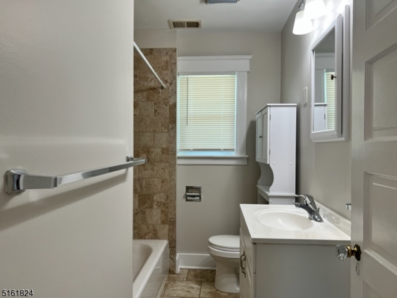 40 Codington Place Somerville, NJ 08876 - Photo 10 of 10 a bathroom with a sink toilet and shower