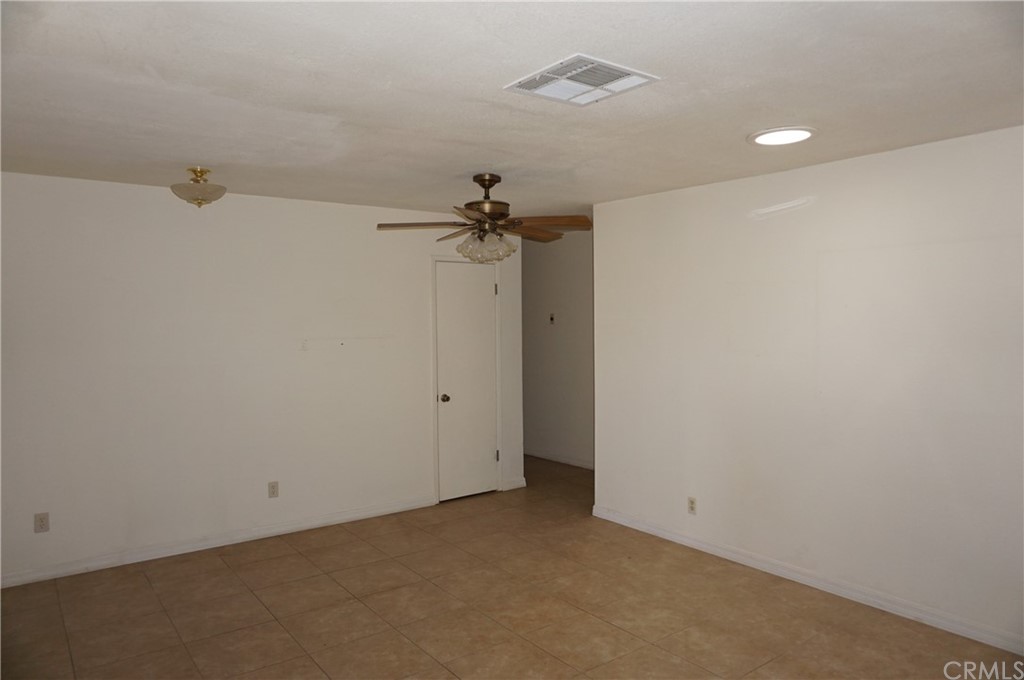 27841 Crestview Road Barstow, CA 92311 - Photo 11 of 28 a view of a room with a chandelier fan