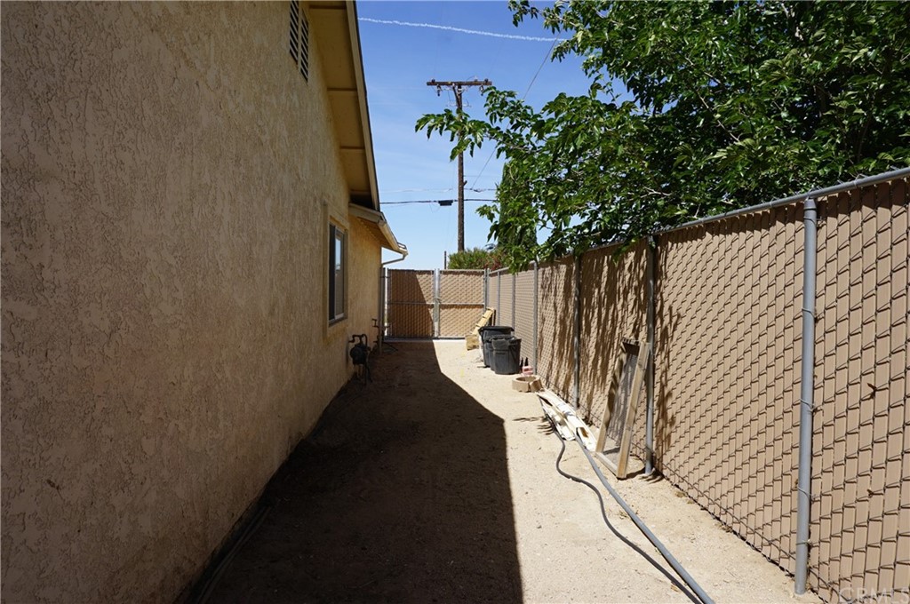 27841 Crestview Road Barstow, CA 92311 - Photo 26 of 28 a view of a pathway of a building