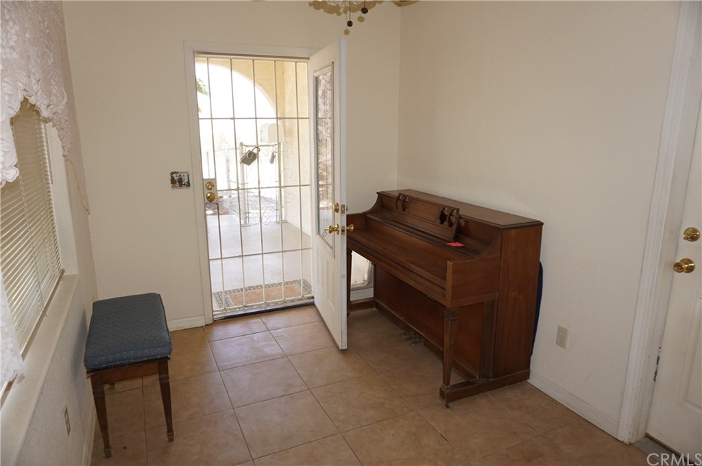 27841 Crestview Road Barstow, CA 92311 - Photo 9 of 28 a room that has a dresser in it
