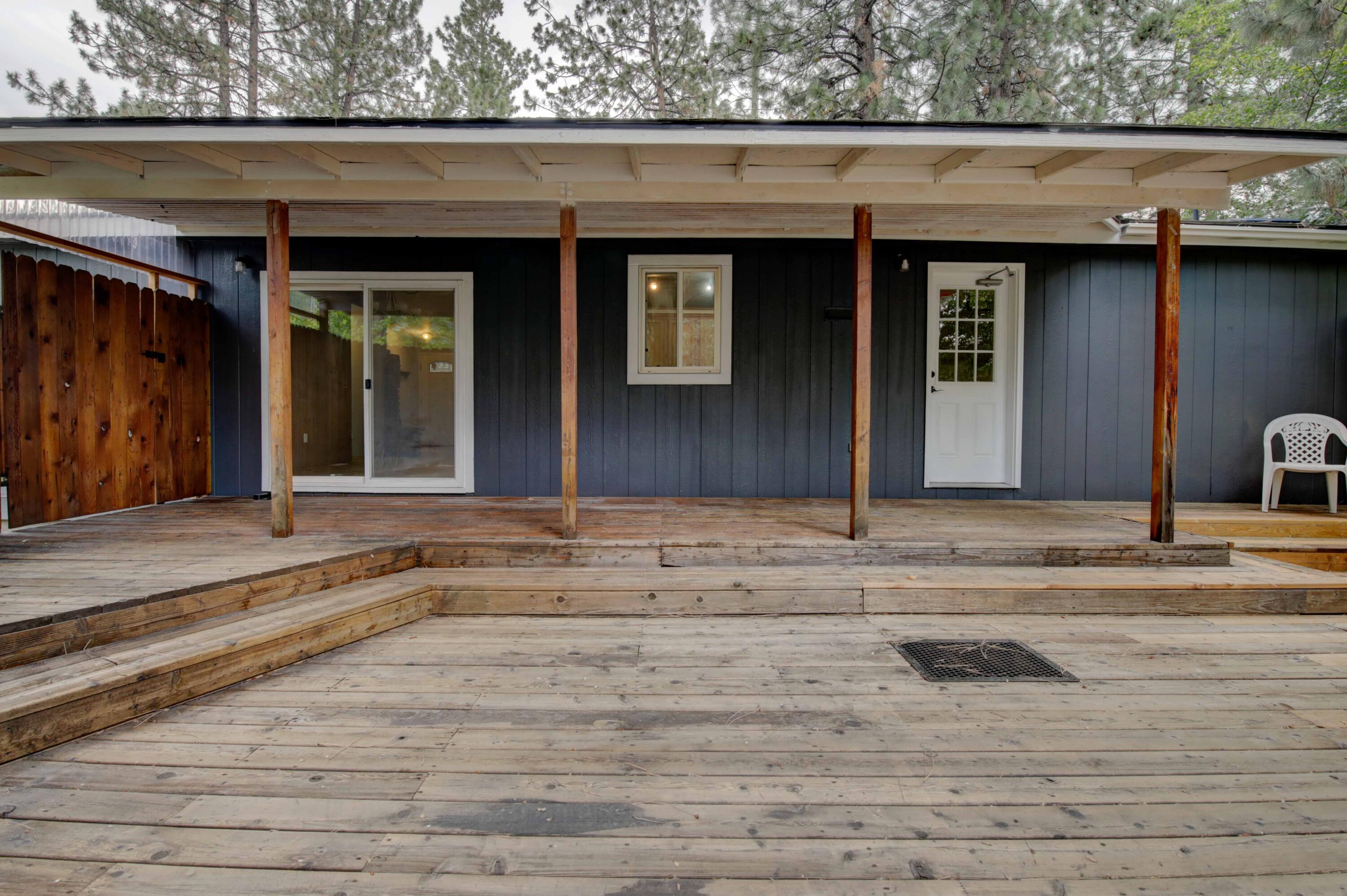 60184 Crater Road Bend, OR 97702 - Photo 25 of 29 Rear multi level deck is partially covered and private.
