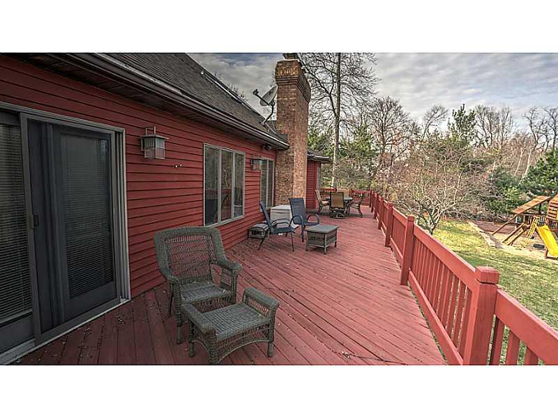 1713 Beaver Grade Road Coraopolis, PA 15108 - Photo 17 of 25 Patio/Deck. Deck spans the entire length of the home and provides a beautiful view of nature in the back yard.