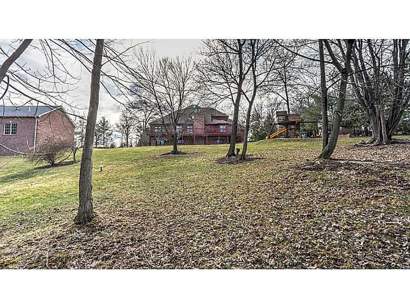 1713 Beaver Grade Road Coraopolis, PA 15108 - Photo 23 of 25 Yard/Garden. Back yard is landscaped with mature trees.