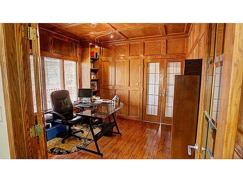 1713 Beaver Grade Road Coraopolis, PA 15108 - Photo 6 of 25 Den. The Den/office has built in oak cabinets and hard wood floor.