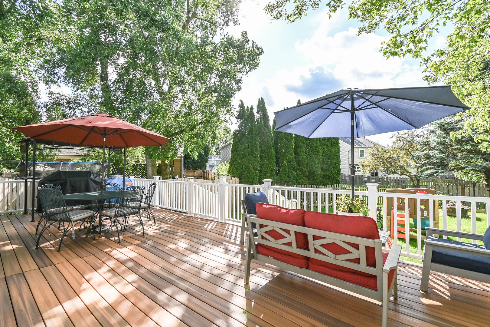 1333 Regency Lane Round Lake, IL 60073 - Photo 25 of 31 a view of a chairs with an umbrella in the patio