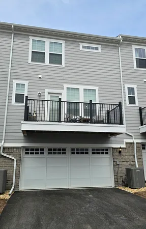a front view of a house with balcony