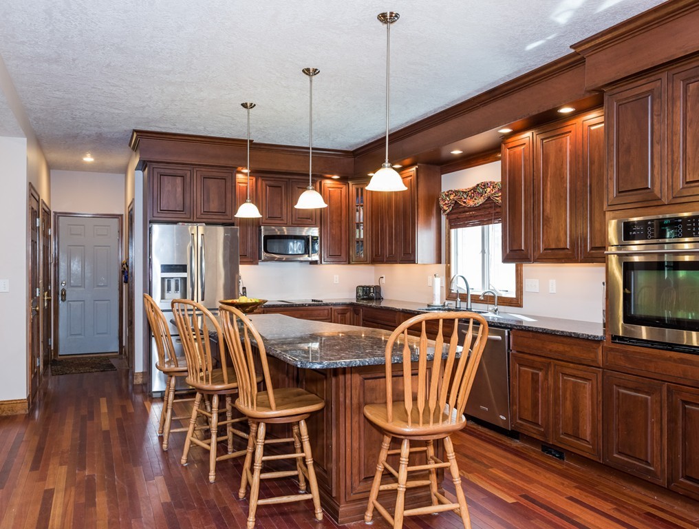 965 Piper Road West Springfield, MA 01089 - Photo 13 of 30 a view of a dining room with furniture window and wooden floor