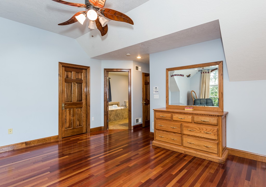 965 Piper Road West Springfield, MA 01089 - Photo 20 of 30 a room with wooden floor closet and chandelier fan