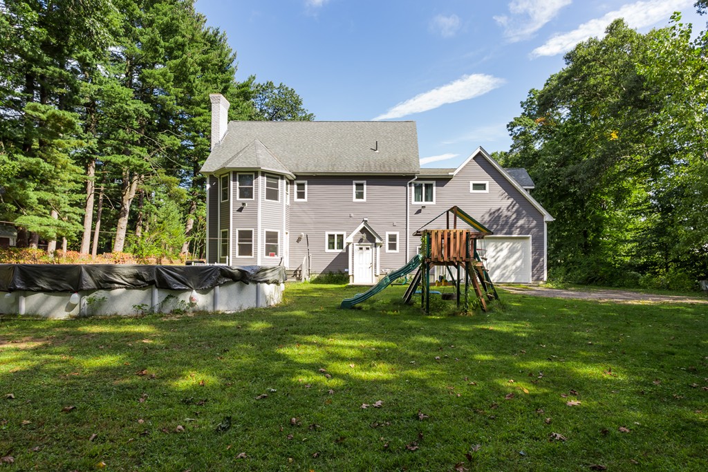 965 Piper Road West Springfield, MA 01089 - Photo 4 of 30 a view of a house with a yard porch and sitting area