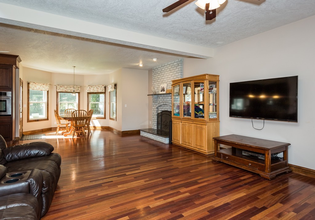 965 Piper Road West Springfield, MA 01089 - Photo 8 of 30 a living room with furniture and a flat screen tv