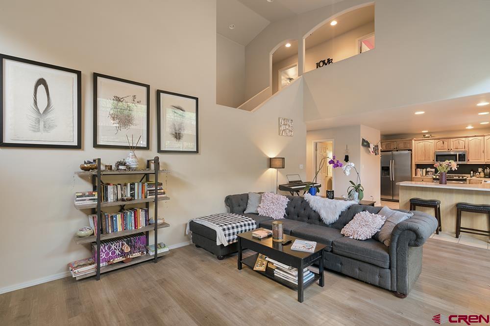 332 Jenkins Ranch Road Durango, CO 81301 - Photo 4 of 34 a living room with furniture a couch and a kitchen view