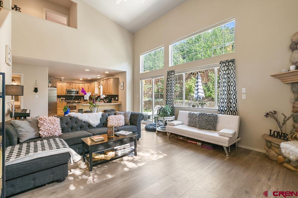 332 Jenkins Ranch Road Durango, CO 81301 - Photo 6 of 34 a living room with furniture and a large window