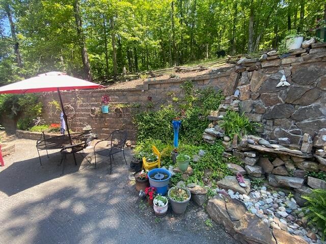 260 Deer Ridge Trail Ocoee, TN 37361 - Photo 14 of 72 a view of a outdoor space with a patio
