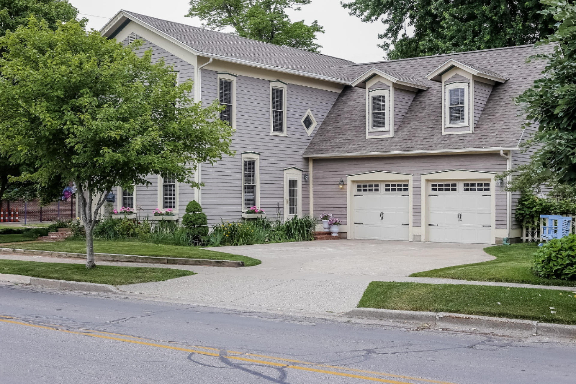 202 Prospect Street Spring Lake, MI 49456 - Photo 4 of 58 004-Front_View-1810455-medium