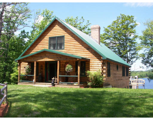 161 Ashby Road Ashburnham, MA 01430 - Photo 1 of 12 a view of a house with yard and front tree