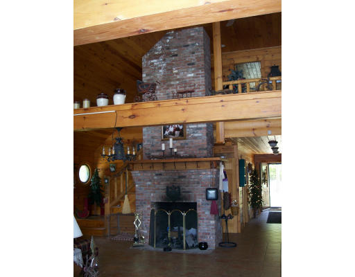 161 Ashby Road Ashburnham, MA 01430 - Photo 5 of 12 a fireplace with wooden floor