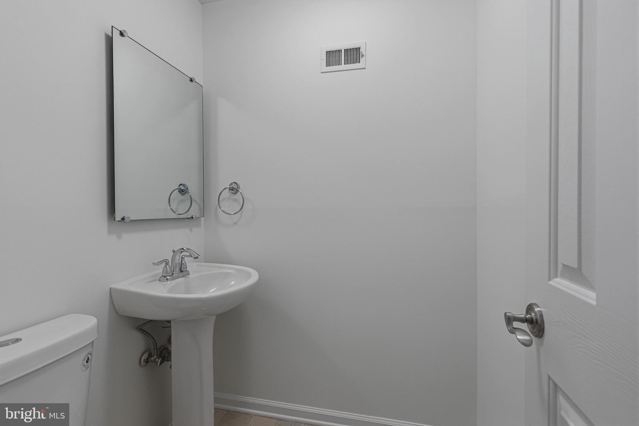 8042 Inverness Ridge Road Potomac, MD 20854 - Photo 28 of 34 Half Bathroom- Lower Level