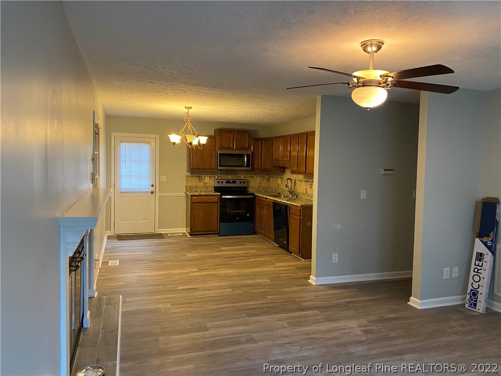 1734 Rim Road Fayetteville, NC 28314 - Photo 6 of 24 a view of a kitchen with a sink