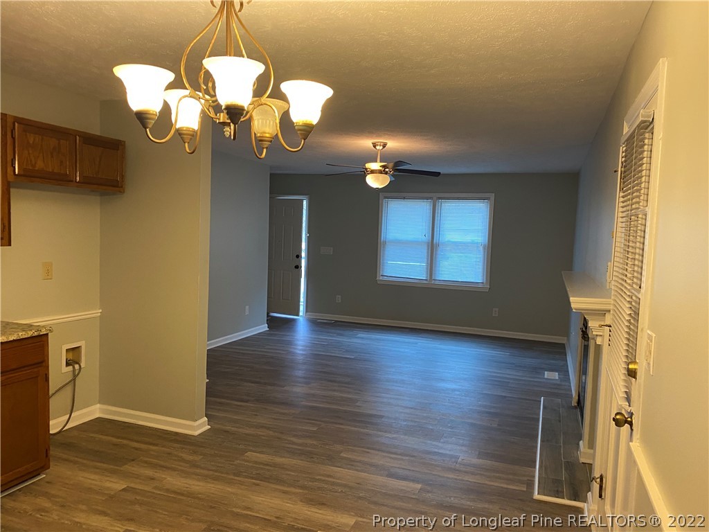 1734 Rim Road Fayetteville, NC 28314 - Photo 7 of 24 a view of a livingroom with a chandelier
