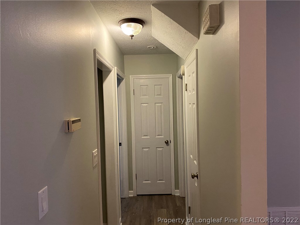 1734 Rim Road Fayetteville, NC 28314 - Photo 8 of 24 a view of a hallway