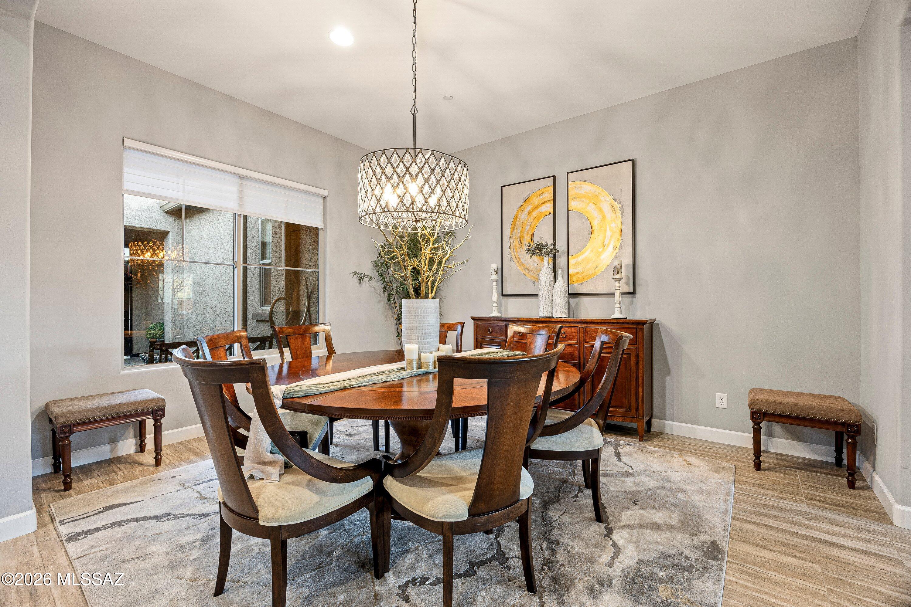 8489 North Lone Ranger Road Tucson, AZ 85743 - Photo 11 of 50 Formal dining with view towards courtyard.