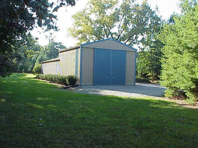 0 South Cottage Grove Avenue Crete, IL 60417 - Photo 13 of 27 a backyard of a house with plants and large tree