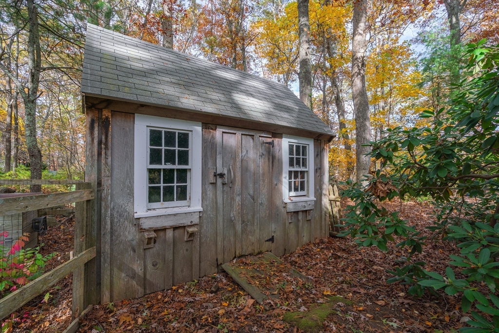 154 Fairview Avenue Rehoboth, MA 02769 - Photo 12 of 25 a view of a house that has window and wooden fence