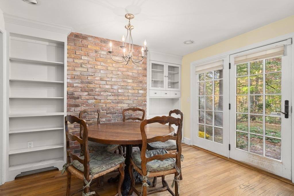154 Fairview Avenue Rehoboth, MA 02769 - Photo 16 of 25 a dining room with furniture and wooden floor
