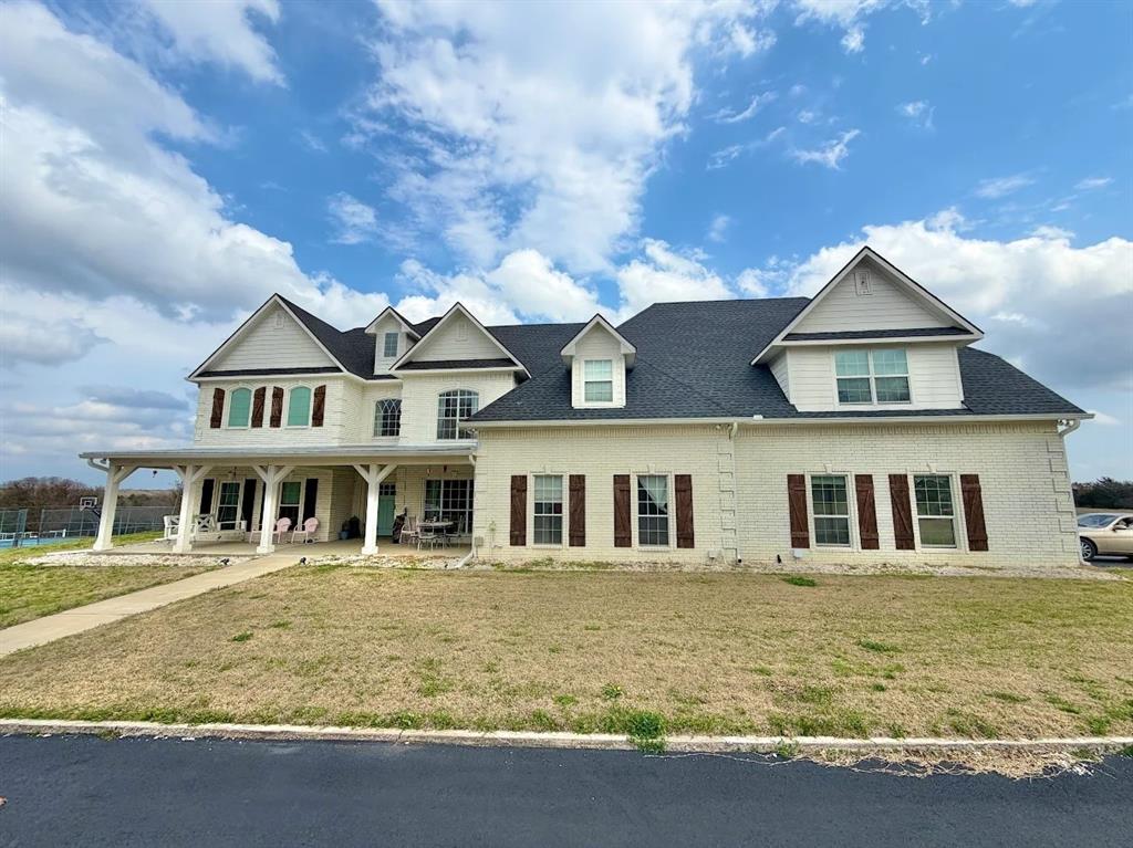 1073 Gordonville Road Gordonville, TX 76245 - Photo 4 of 4 a front view of residential houses with yard