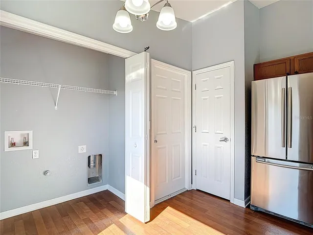 an empty room with fan and a ceiling fan