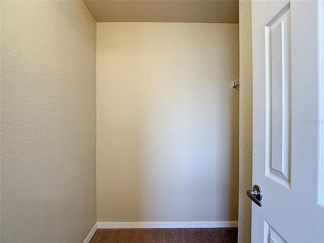 a view of a large body of water with a building in the background