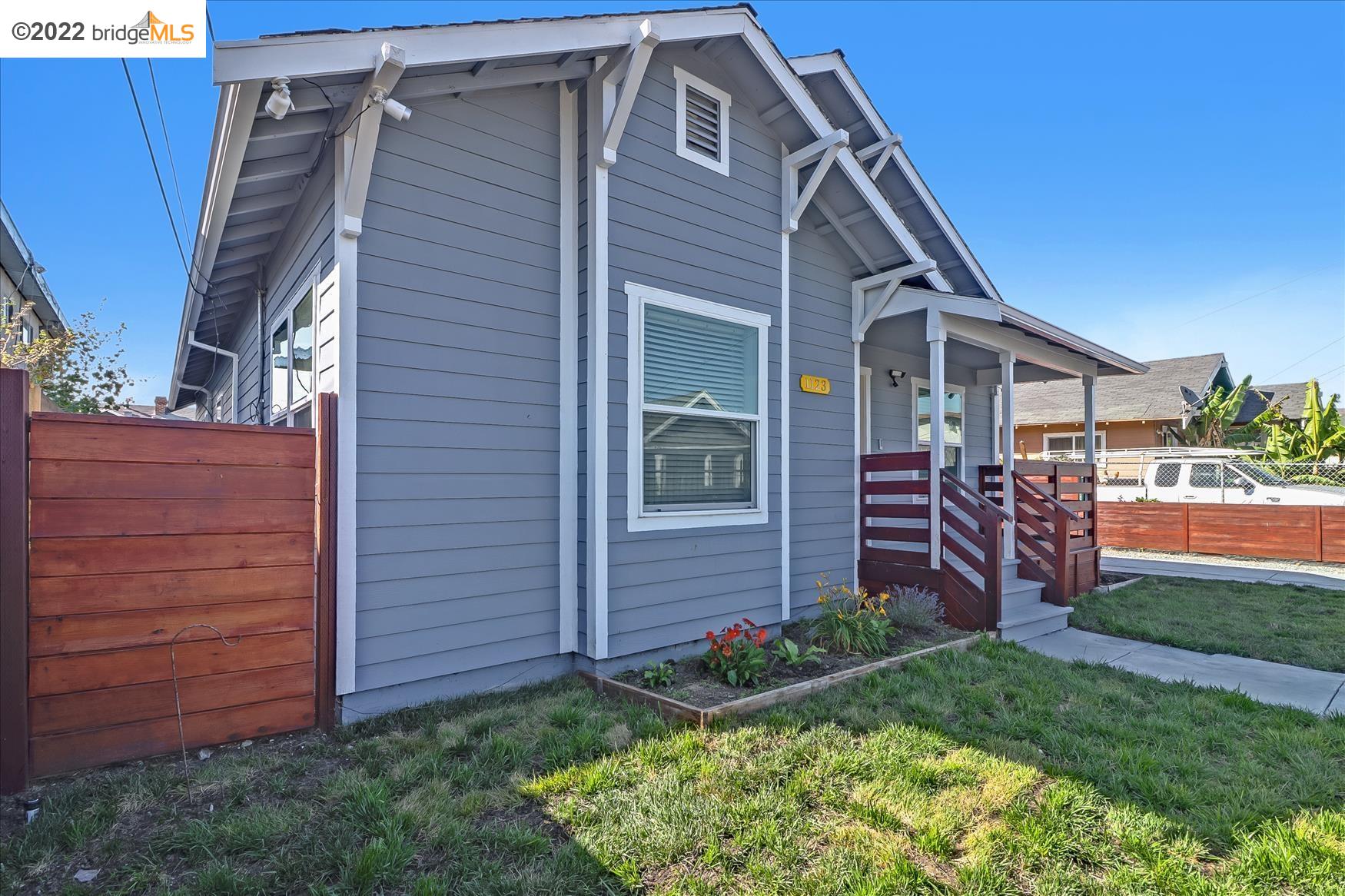 1123 70th Avenue Oakland, CA 94621 - Photo 1 of 1 a front view of a house with garden